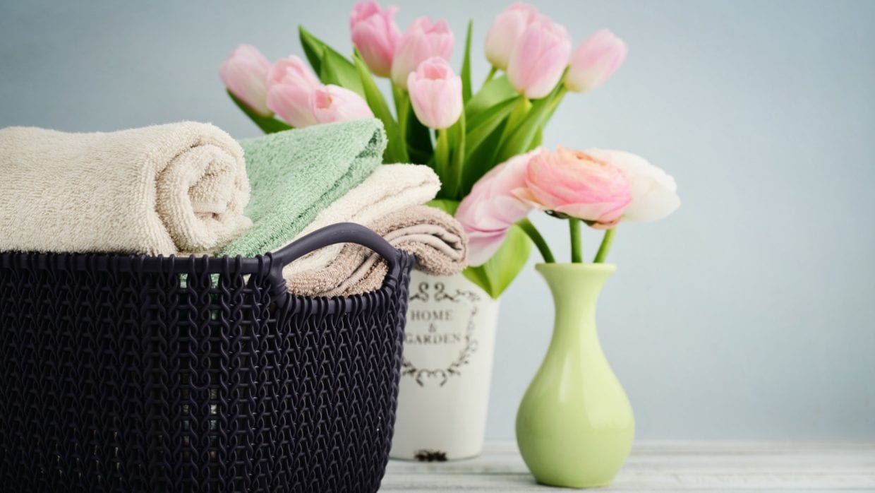 Airbnb Host Pockets Cleaning Fee basket of towels and flowers