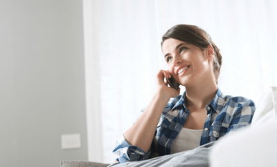 What is an Airbnb Superhost, Woman on Phone