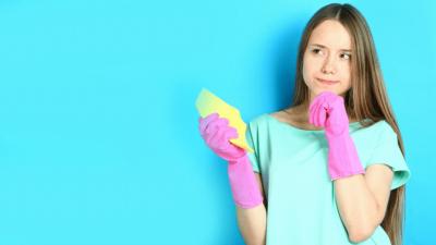 Get More Airbnb Cleaning Jobs, Woman Holding Sponge Thinking