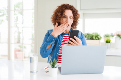 House Cleaner Woes - Vacation Rental Mailbag, Shocked Woman Looking at Her Phone