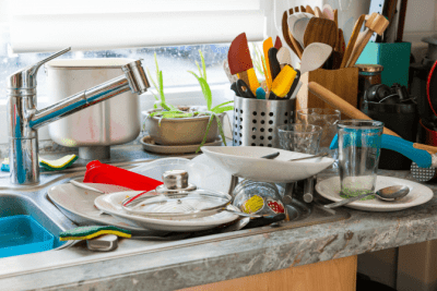 Messy BNB, Dishes Piled Up in Messy Kitchen