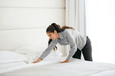 VRBO Cleaning Gone Bad, Woman Making Bed