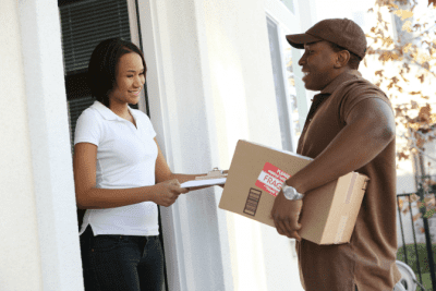 Airbnb Supplies Madness, Man Delivering Package to Woman